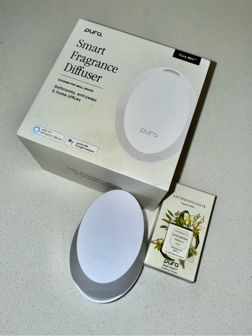 Pura mini home diffuser + Sandalwood vanilla